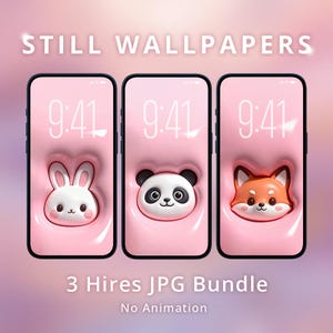 Op de afbeelding: Drie smartphoneschermen met roze achtergronden met schattige dierenontwerpen: een konijn, een panda en een vos. Elk scherm toont de tijd 9:41. De tekst "STILL WALLPAPERS" en "3 Hires JPG Bundle" is ook zichtbaar.