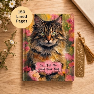 May include: A rectangular journal featuring a watercolor illustration of a long-haired tabby cat surrounded by pink flowers. A pink label on the cover displays the text "So... Tell Me About Your Day." The journal includes 150 lined pages.