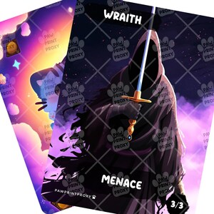 May include: Two fantasy-themed cards. One card features a cat silhouette against a colorful sunset. The other card depicts a hooded figure holding a sword, with the words "WRAITH" and "MENACE" displayed. The card also has the number "3/3".