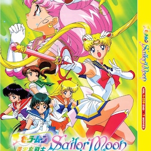 May include: DVD cover for Sailor Moon, featuring multiple anime characters in sailor-style outfits. The cover is predominantly yellow and green, with the title in English and Japanese. Text includes "VOL. 1-239 END + 7 MOVIES".