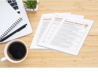 May include: A workspace scene featuring a laptop, notebook, pen, and a cup of coffee. Several white sheets of paper with the title "Personality Assessment" are visible. A small potted plant adds a touch of greenery to the wooden desk.
