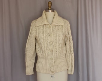 Classic collared wool knitted cardigan with chunky cable knit design