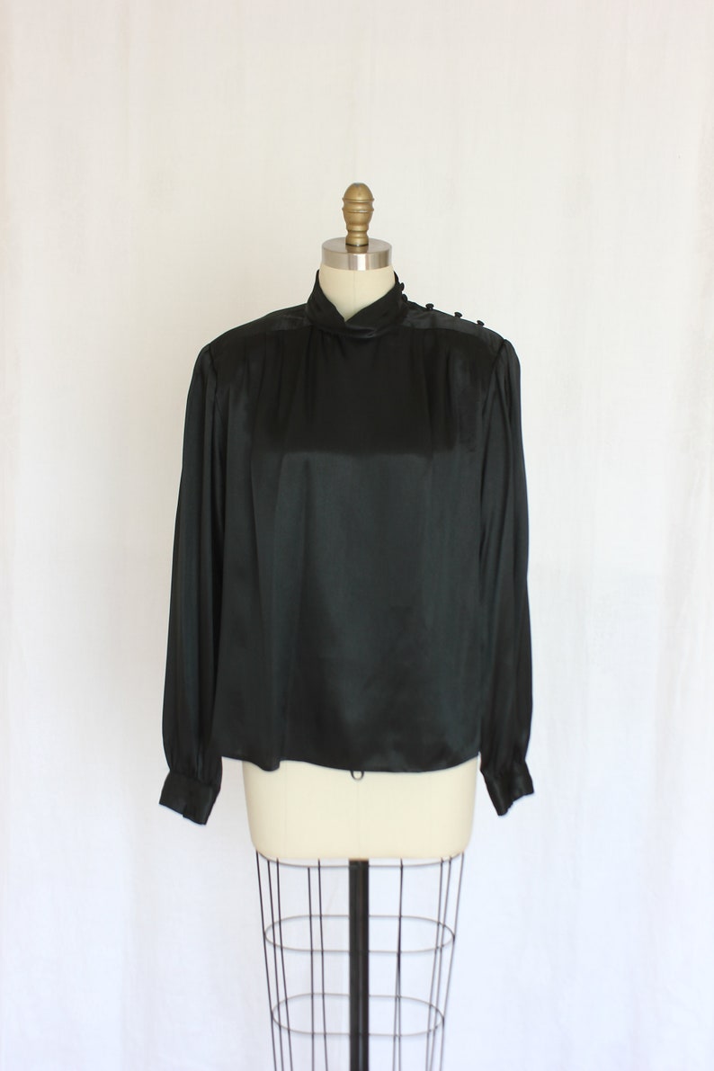 long sleeve blouse in satiny black size 10