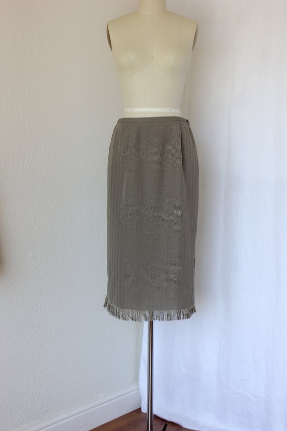 Fringed brown skirt with herringbone pattern, full