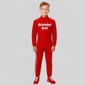 May include: A bright red racing jumpsuit featuring a high collar, long sleeves, and white vertical piping along the sides. The chest area displays the white text Branded Suit. The garment is paired with matching red lace-up athletic shoes.