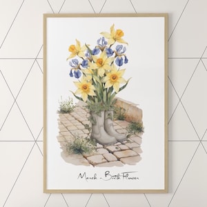 Peut inclure: Une peinture à l'aquarelle d'un bouquet de jonquilles jaunes et d'iris bleus dans une paire de bottes de pluie grises. Les fleurs sont disposées dans un style naturel et fluide, et les bottes sont posées sur un chemin de pavés de pierre. Le texte "March - Birth Flower" est écrit sous l'image.