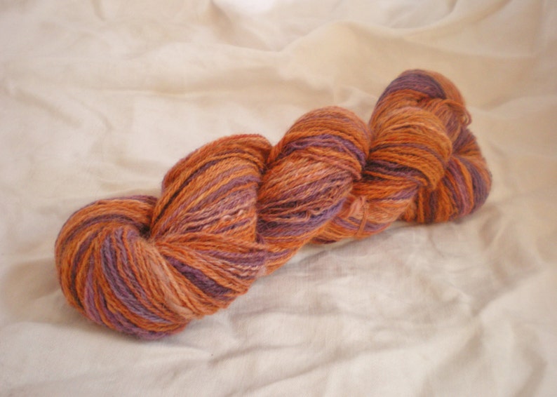 Handspun Merino Wool Yarn fingering pumpkin and purple 330 yds image 1