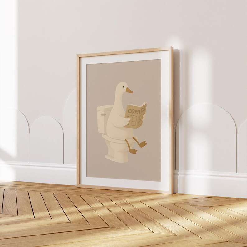 Funny duck on toilet wall art print, bathroom humor decor poster, duck reading newspaper illustration, comedic restroom wall hanging, animal bathroom art, quirky toilet humor print, beige neutral bathroom artwork, minimalist funny poster, Danish hygge style decor, bathroom joke art, goose toilet print, witty animal illustration, modern bathroom wall decor, neutral farmhouse bathroom art, comedy duck poster, lighthearted restroom decor, Scandinavian minimalist print, amusing bird artwork.