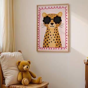 Pink cheetah nursery wall art with flower sunglasses perfect for baby girl room decor - adorable leopard print with pink scalloped border ideal for little girl bedroom, feminine nursery design, pink themed children's room, girly animal wall art, baby girl nursery prints, toddler girl bedroom decor, pink and yellow nursery color scheme, cute girl room accessories, feminine kids wall decor, baby girl shower gift, pink nursery wall gallery, girly safari theme, sweet girl bedroom art, pink decor.