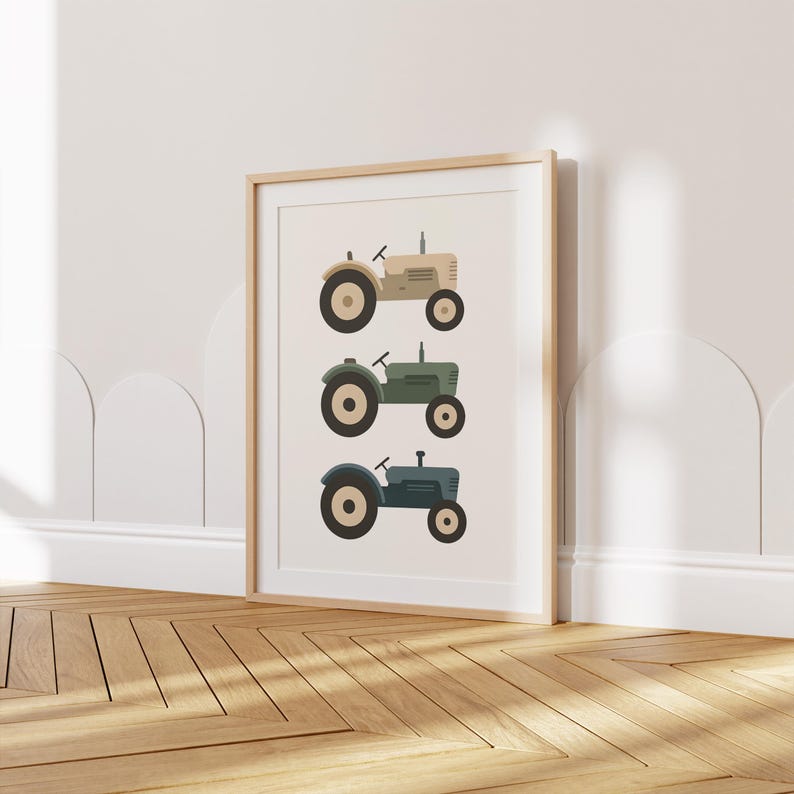 Farm-themed kids wall art showing a trio of vintage tractors illustrated in soft neutral colors. The poster includes a beige tractor, a green tractor, and a blue tractor in a clean, modern, Scandinavian-inspired style. Perfect for nursery decor, toddler rooms, and playrooms with rustic or countryside themes. This printable tractor artwork adds charm to farm nurseries, boy bedrooms, and minimalist children’s interiors.