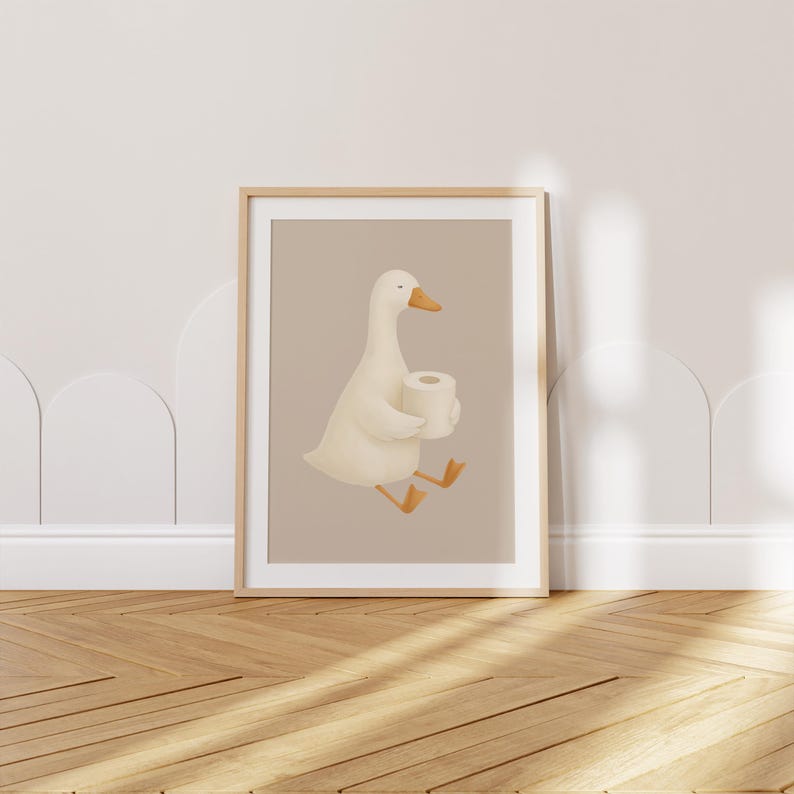 White duck wall art print, minimalist farmhouse animal illustration, nursery decor with walking duck, gender neutral baby room art, Scandinavian style duck poster, cottage core nursery prints, natural wood frame animal art, soft neutral nursery wall decor, whimsical duck illustration for kids room, modern farmhouse bathroom art, cute duck print for children, beige and white nursery aesthetic, simple animal wall art, playful duck nursery theme, downloadable duck print, farmhouse chic baby decor.