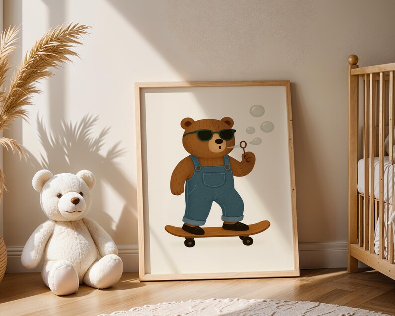 Cool skateboarding bear wall art printable in boho nursery with pampas grass and warm natural light – cute bear with sunglasses, denim overalls, and bubbles on skateboard – digital download poster for baby room or toddler nursery – modern bohemian kids room decor with neutral tones – bear illustration for gender-neutral nursery – instant download animal wall art – wooden frame children’s poster – cozy boho nursery inspiration with teddy bear and crib.