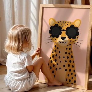Child with leopard nursery wall art - cute spotted cheetah print for kids bedroom decor, large framed animal poster perfect for toddler room, safari themed nursery artwork with sunglasses, wooden frame children's wall decor, playful jungle animal illustration, modern kids room art print, gender neutral nursery decor, oversized animal poster for playroom, Scandinavian style children's art, baby nursery wall hanging, contemporary animal themed decor, kids safari bedroom art.