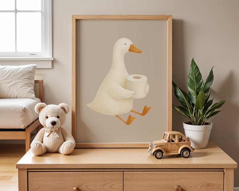Goose holding toilet paper wall art, funny bathroom decor for kids, humorous potty training print, quirky children's bathroom poster, playful goose toilet paper illustration, gender neutral bathroom humor art, whimsical farmhouse kids bath decor, cute animal bathroom joke print, modern nursery bathroom wall art, Scandinavian style funny bathroom poster, wooden frame toilet humor for children, lighthearted potty training encouragement, charming kids bathroom wall decor, silly goose bathroom art.