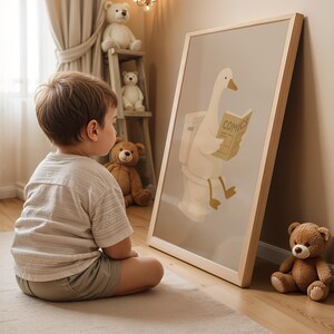 Kids bathroom wall art print, funny duck reading on toilet poster, children's bathroom decor, potty training encouragement art, toddler bathroom wall hanging, playful animal illustration for kids, nursery bathroom sign, cute duck comics print, child friendly bathroom humor, educational toilet art, preschool bathroom decor, gender neutral kids art, warm neutral children's print, Montessori bathroom poster, positive potty training decor, Scandinavian kids room art, gentle humor kid's illustration.