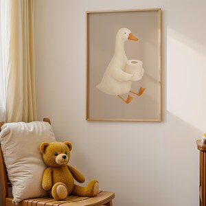 Funny goose carrying toilet paper wall art, humorous bathroom print for kids, playful potty training bathroom decor, quirky goose toilet paper illustration, children's bathroom humor art, gender neutral kids bath wall decor, whimsical farmhouse bathroom poster, cute animal bathroom joke print, nursery bathroom wall art ideas, Scandinavian style funny bathroom decor, wooden frame toilet humor art for children, silly goose bathroom print, modern farmhouse kids bath humor, unique potty training art