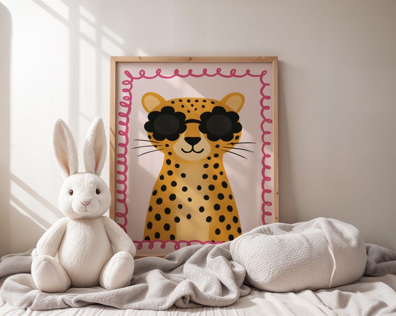 Adorable cheetah wall art with flower sunglasses in cozy nursery setting - cute leopard print with pink scalloped border perfect for baby room decor, neutral nursery design, soft textiles nursery, minimalist kids room art, Scandinavian style nursery, white bunny plush toys, gentle nursery styling, calm baby room atmosphere, natural light nursery, serene children's decor, peaceful nursery vibes, soft color palette kids art, hygge nursery design, comforting baby room.