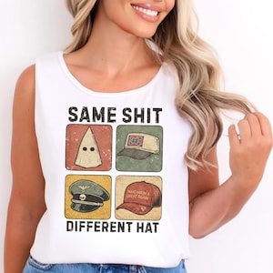 May include: White vest top featuring the text "SAME SHIT DIFFERENT HAT" and four images of different hats. The top is worn with blue denim shorts. The design has a vintage, distressed appearance.