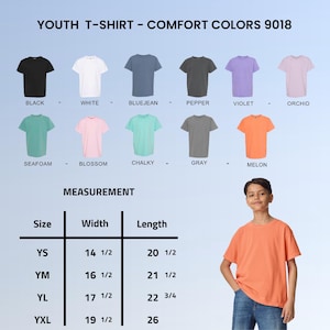 May include: A youth t-shirt in melon color is modeled in this image. The image also displays a color chart with various t-shirt colors, including black, white, bluejean, pepper, violet, orchid, seafoam, blossom, chalky, and gray. Measurement details are also provided.