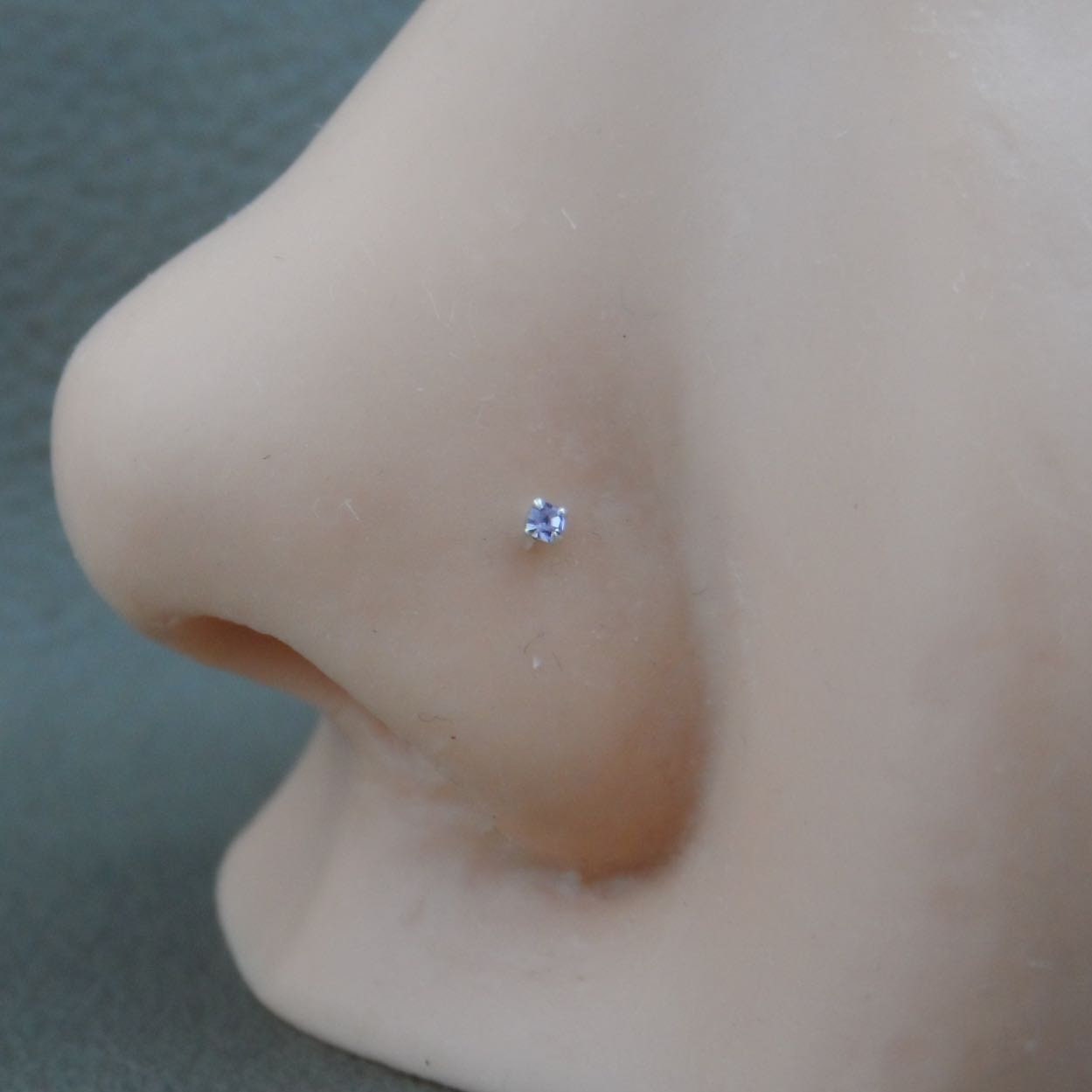 Purple nose best sale stud