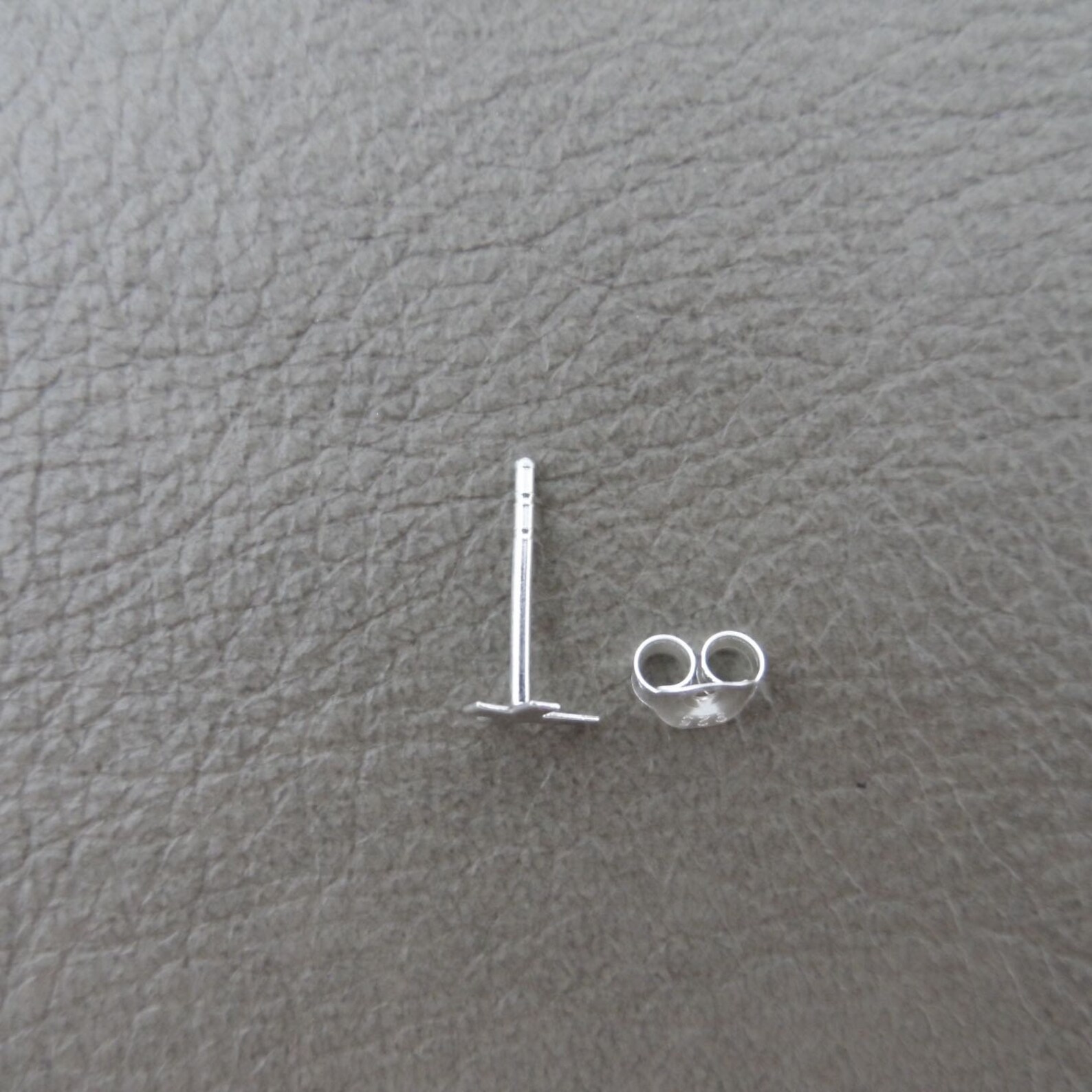 One cross earring one stud Clearance