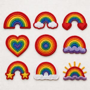 May include: A collection of nine embroidered patches featuring rainbow motifs. Designs include simple rainbows, rainbows with white clouds, heart-shaped rainbows, a circular rainbow, a rainbow with purple clouds, star-accented rainbows, and a sun-ray rainbow.