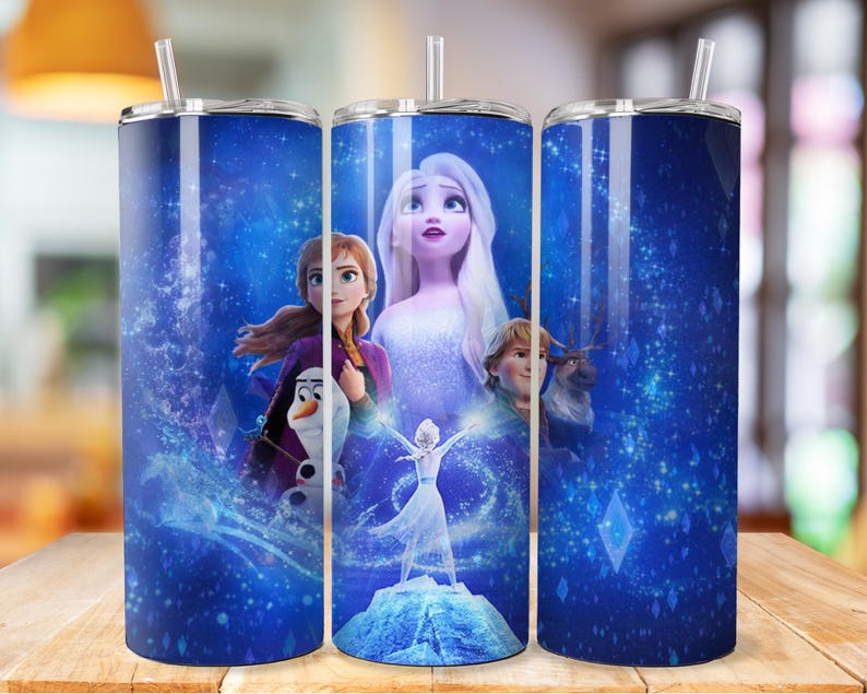 May include: A blue and white stainless steel tumbler featuring a design with characters from the animated film Frozen. The design includes Elsa, Anna, Olaf, and Kristoff. The tumbler has a straw and a lid.
