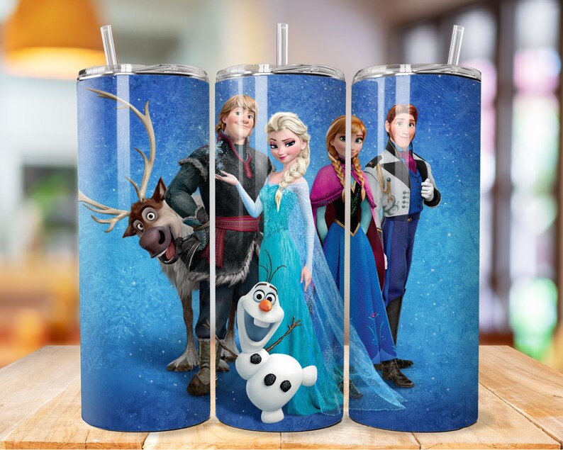May include: A blue and white stainless steel tumbler featuring a design with characters from the animated film Frozen. The design includes Elsa, Anna, Kristoff, Olaf, and Sven the reindeer.