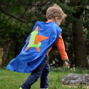 SINGLE-SIDED CAPES with Emblem and Initial.
