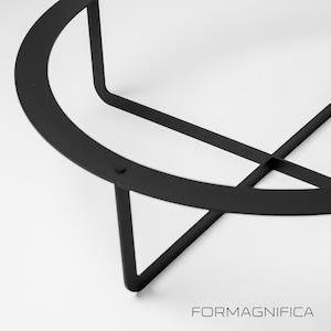 Sculptural X-shape table legs in durable steel