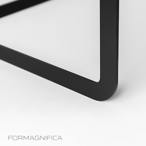 Designer metal table base for custom glass top