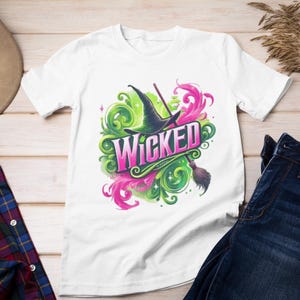 Wicked Shirt | Wicked t-shirt | Wizard of Oz Inspired Fan Merch | Elphaba & Glinda Graphic Tee | Musical Gift | Unisex Heavy Cotton Tee