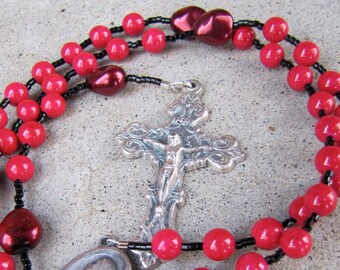 Hot pink (magenta) and black Rosary with fossil, glass, and pewter