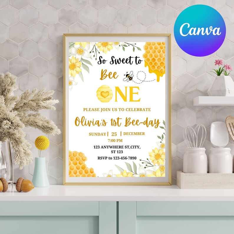 May include: A framed invitation with a bee theme. The text reads "So Sweet to Bee One" with floral and honeycomb accents. The invitation is for Olivia's 1st Bee-day, with date, time, and RSVP information. The Canva logo is in the upper right corner.