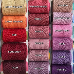 May include: A collection of colorful spools of twine, each labeled with a unique color name. Colors include Milky Brown, Terracotta, Light Yellow, Pomegranate, Salmon, Sky Blue, Fern Green, and many more. Ideal for crafting and DIY projects.