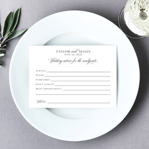 Classic black and white wedding wish card set ready for guests to share advice and wishes for the bride and groom. Perfect as a formal guestbook card alternative, bridal shower game, or fun wedding game during the rehearsal dinner.