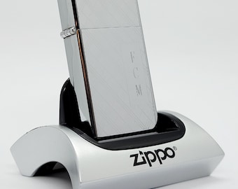 Accendino Zippo Slim vintage del 1973: cromato lucido, inciso FCM, nuovo di zecca nella sua scatola