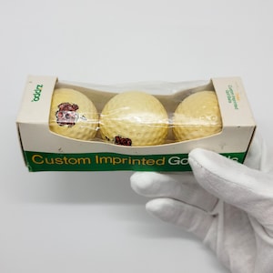Vintage 1983 Zippo Golf Balls with Tiger Design - Rare Collectible Set in Original Box