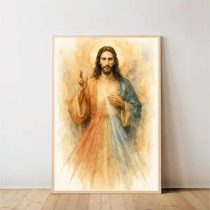 Könnte beinhalten: Aquarellmalerei einer Figur mit langen braunen Haaren, Heiligenschein und Bart, die eine blaue und orangefarbene Robe trägt. Das Kunstwerk ist in einem hellbraunen Holzrahmen gerahmt und wird vor einer weißen Wand und einem Holzboden ausgestellt.