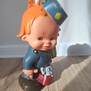 Vintage Spanish Rubber Postman Toy: 1960s Squeaky Figurine