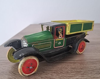 ヴィンテージ J. Chein ブリキ製ゼンマイ仕掛けの高級食料品おもちゃの