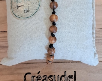Armband med pärlor i olivträ