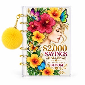May include: A clear plastic binder featuring a $2,000 SAVINGS CHALLENGE cover with a profile illustration of a person surrounded by red and yellow hibiscus flowers and colorful butterflies, accented by a gold chain with a yellow pom-pom charm.