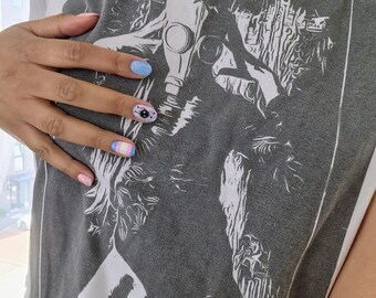 Gas Mask Woman Graphic Tee | Surreal Art T-Shirt | Alt Psychological | Soft Organic Cotton | Halloween Psychometric Test | Everyday Boxy Top