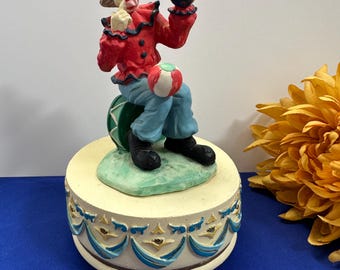 Vintage clown music box figurine
