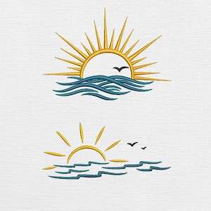 May include: Embroidered designs of a yellow sun rising over blue waves, with a black bird flying above. The second design shows a similar scene with two birds. The designs are on a white background.