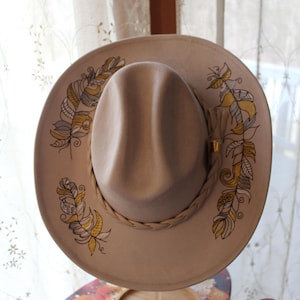 Hand painted feathers, velvet suede light beige cowboy style hat with braded band, hat for women.