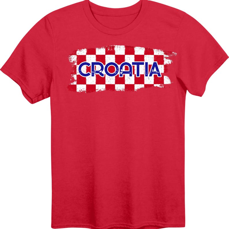 May include: A bright red short-sleeve t-shirt featuring a central graphic of a red and white checkered pattern with a distressed, brush-stroke effect. The word CROATIA is printed in bold, dark blue capital letters across the center of the design.