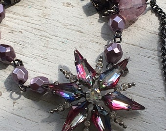 Vintage starburst purple-rhinestone pin with stormy rhinestone cup chain and faceted beads necklace