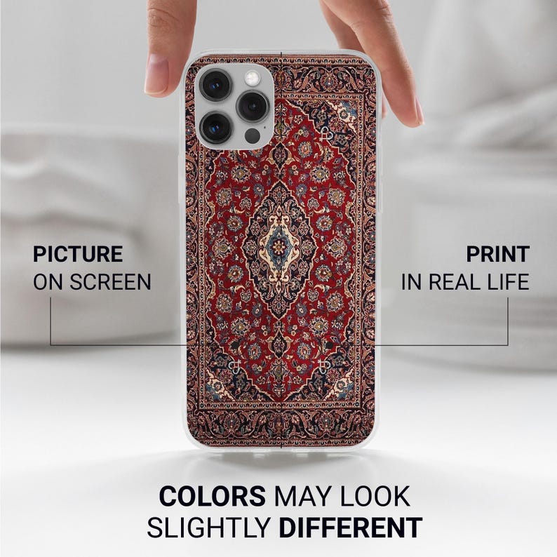 May include: A white iPhone case with a colorful Persian rug design. The case has a cutout for the camera lens.